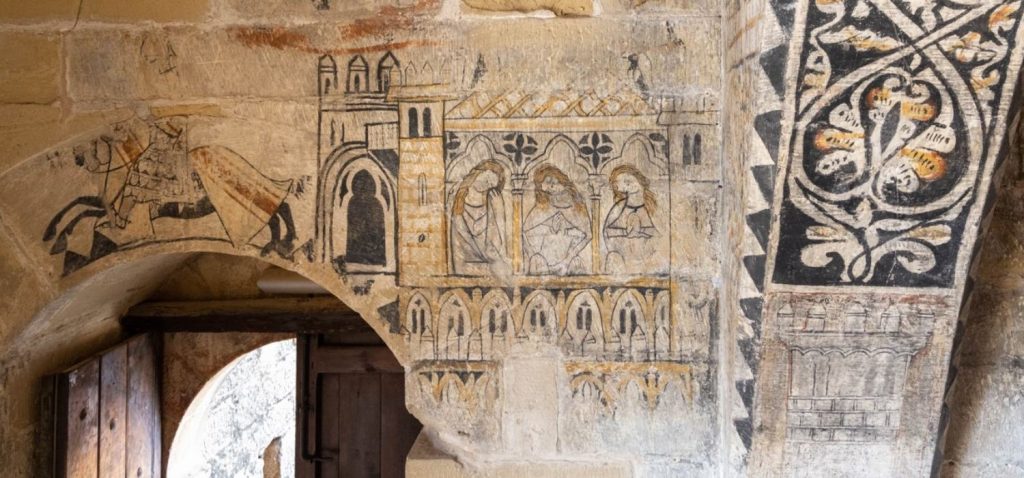 Una investigación de la UCA redefine la interpretación histórica de las pinturas góticas del castillo de Alcañiz